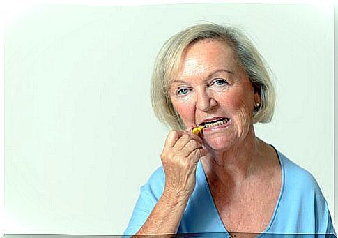 Older woman with yellow teeth