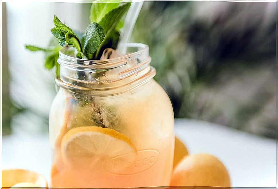 Homemade lemonade with fruits.