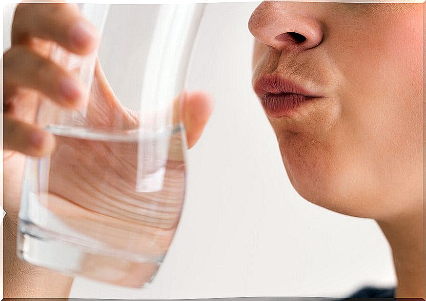 Woman with a mouthwash.