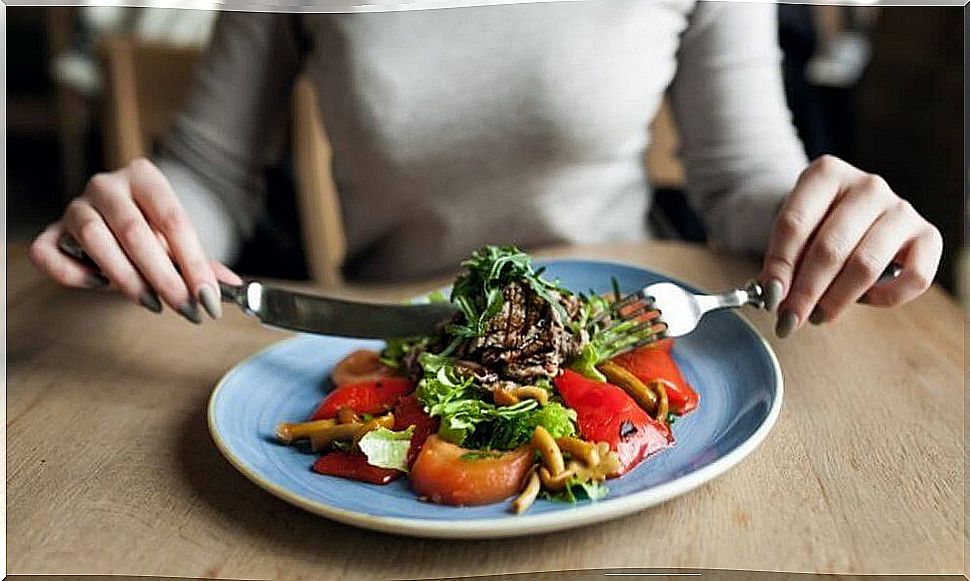 Woman at the table following a good diet